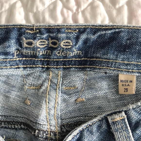 Bebe premium denim flared bottoms with rips. - Picture 3 of 4